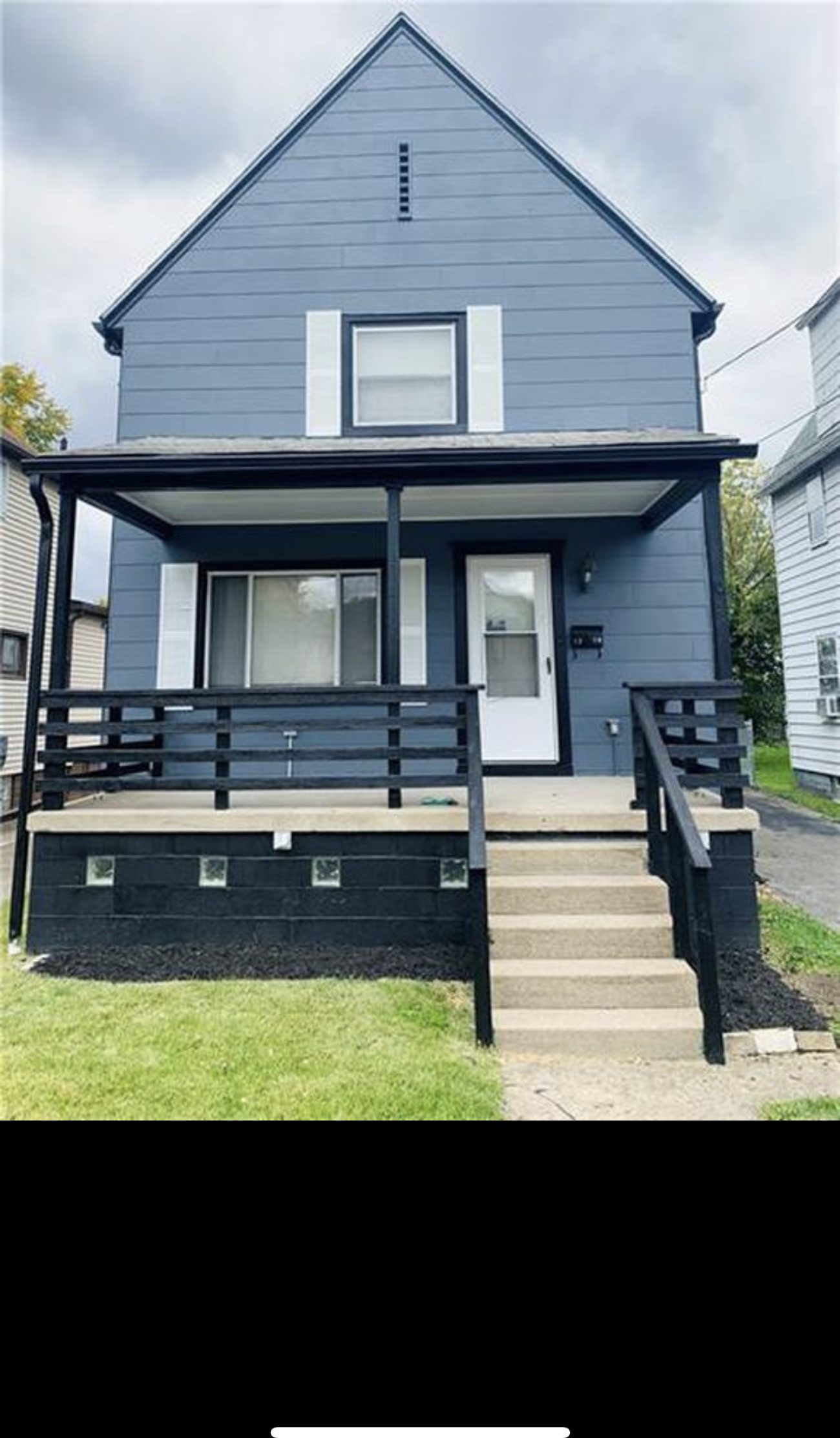 Full exterior home remodel with new siding, trim, and porch by Keystone Horizon Construction