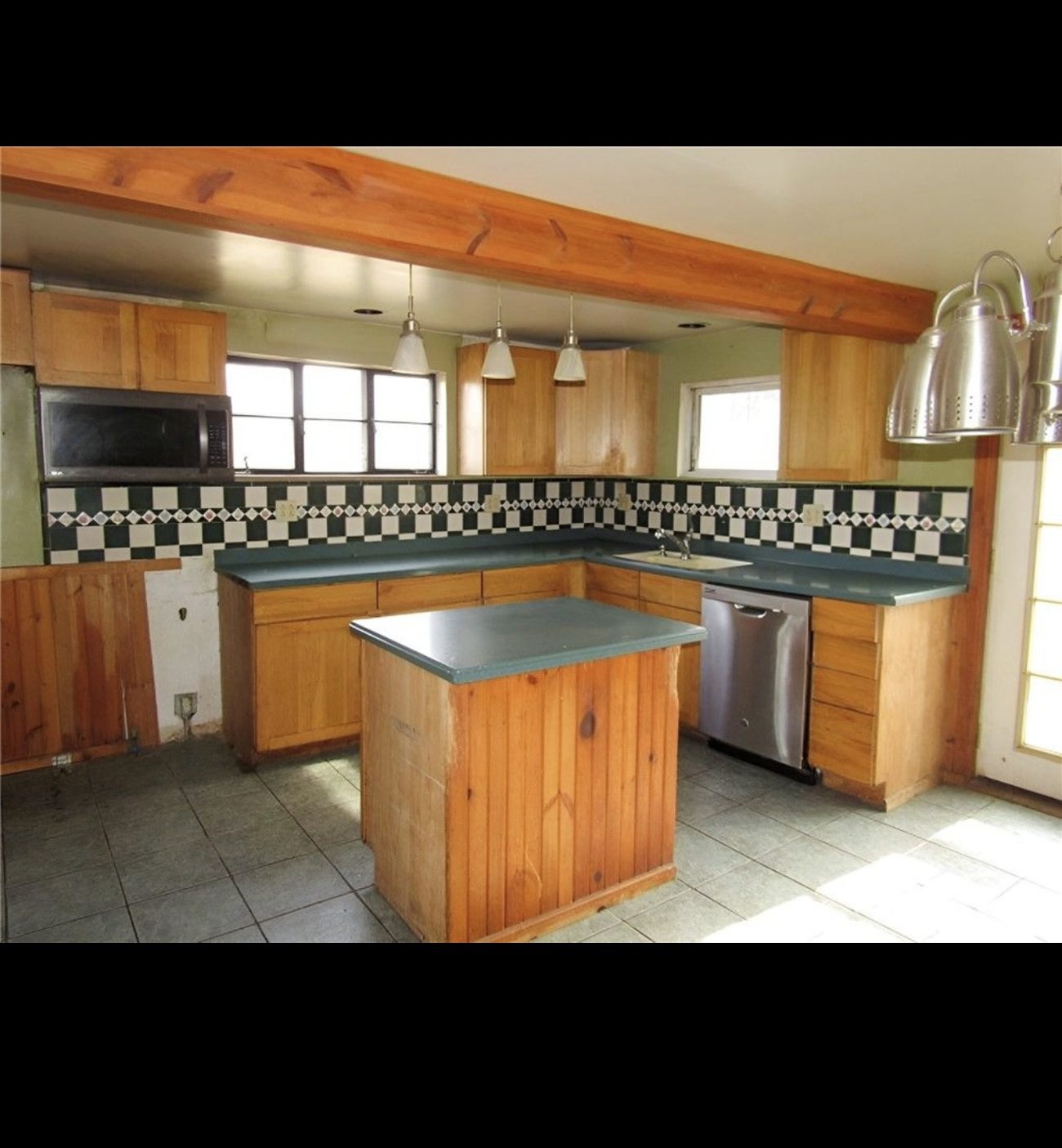 Dated kitchen before renovation